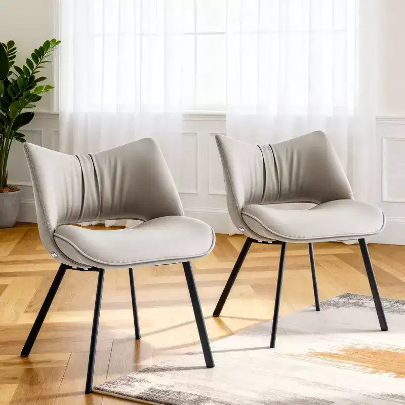 Sedia da pranzo moderna imbottita con schienale curvo e gambe in metallo nero - Grigio chiaro