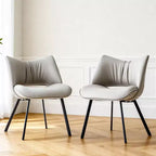 Sedia da pranzo moderna imbottita con schienale curvo e gambe in metallo nero - Grigio chiaro
